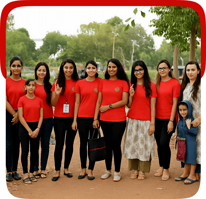 Group of Pararthya SDECS volunteers in red t-shirts standing together at a community event