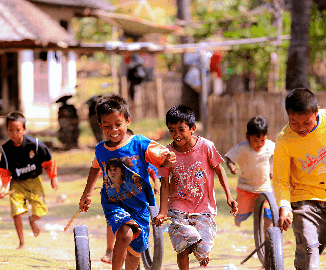 Children holding books at a Pararthya SDECS education drive