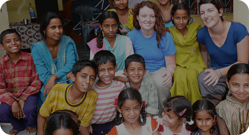Pararthya SDECS volunteers with children at a community event