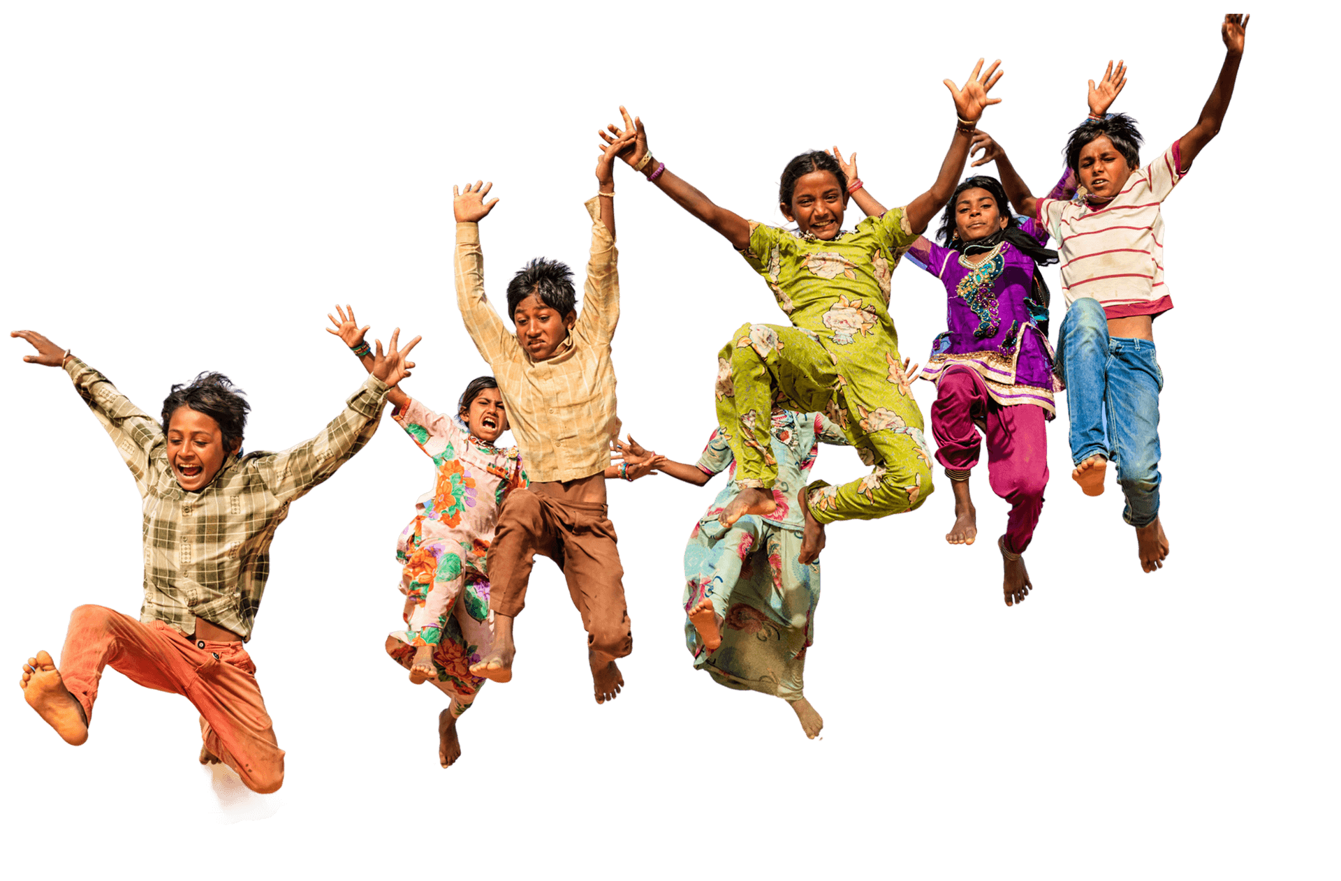 Joyful children jumping in celebration, representing the communities Pararthya SDECS has reached